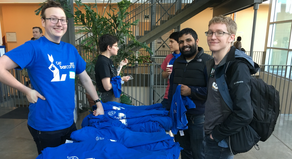 participants getting t-shirts